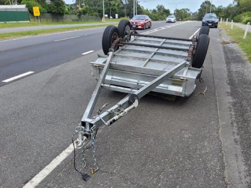 Tow truck job: Trailer upside down